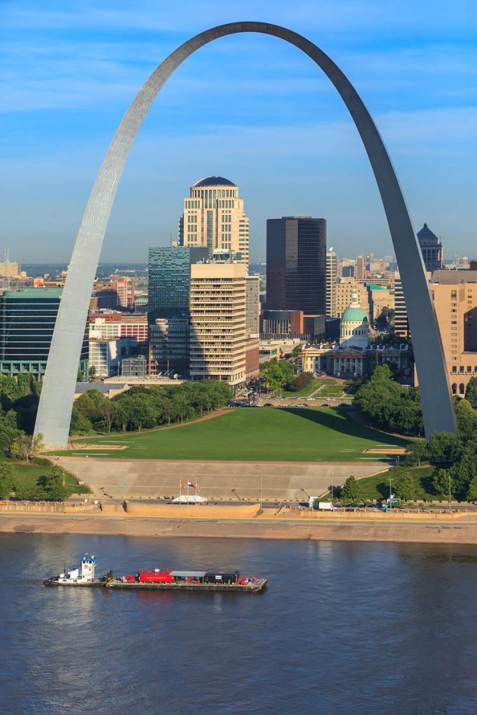 Barge Sailing in Front of Gateway Arch